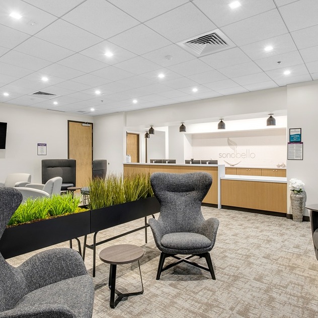 View of lobby and front desk at Sono Bello in Ontario, CA