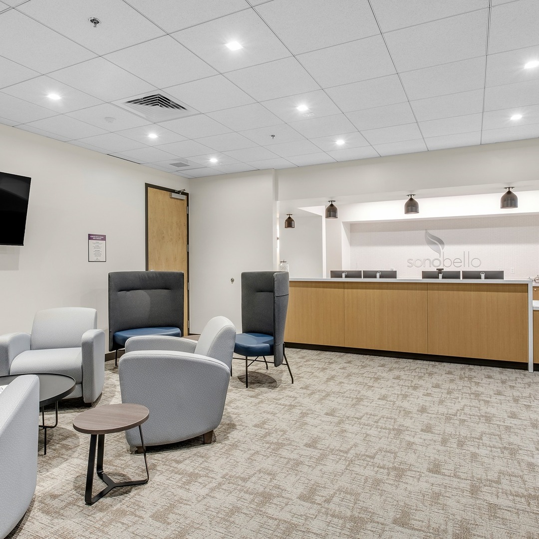 Reception area and front desk at Sono Bello laser liposuction and body contouring center