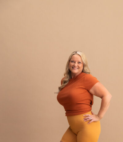 Sono Bello model on a tan background