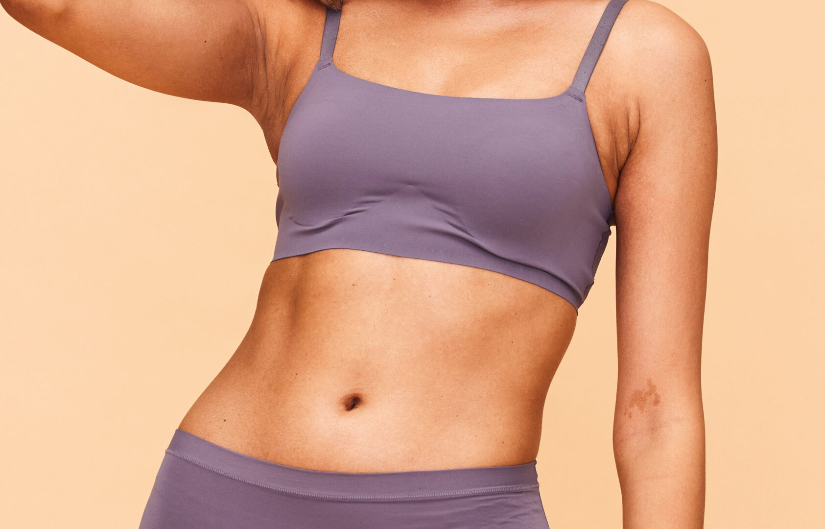 Healthy body, dance and happy woman in lingerie in studio