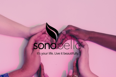 Diverse hands forming a heart shape under the Sono Bello logo with the tagline, "It's your life. Live it beautifully."