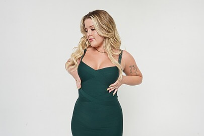 Woman posing after breast enhancement procedure