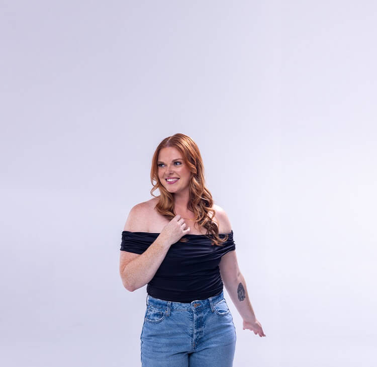 Ambassador for Sono Bello laser liposuction posing after procedure