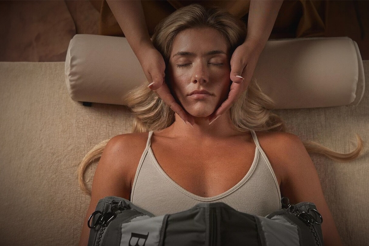 Patient relaxing during breast augmentation recovery with BallancerPro