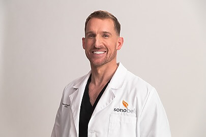 Sono Bello board-certified surgeon smiling