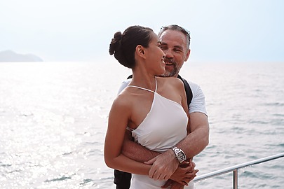 Man and woman enjoying time together on boat