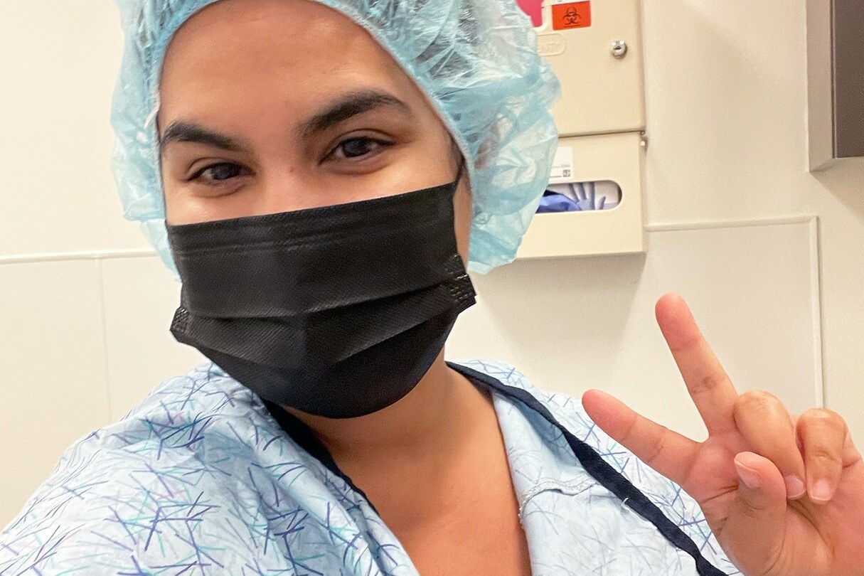 Sono Bello patient taking a selfie before fat removal procedure