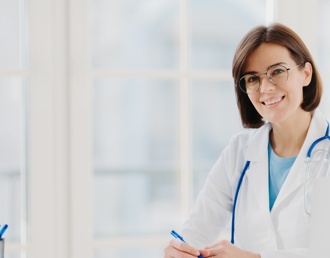 Sono Bello doctor at desk