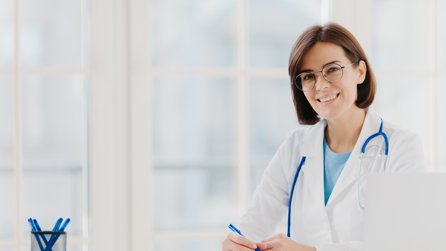 Sono Bello doctor at desk